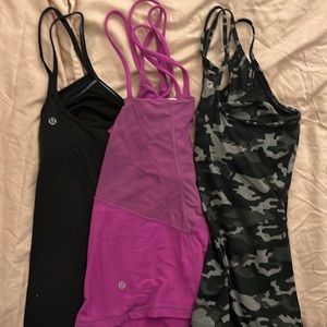 BUNDLE OF 3 work out tops. $45. 2 LULULEMON and 1 Fabletics   SIZE 4 and 6.